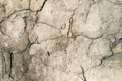 Texture of old stone wall covered with cement