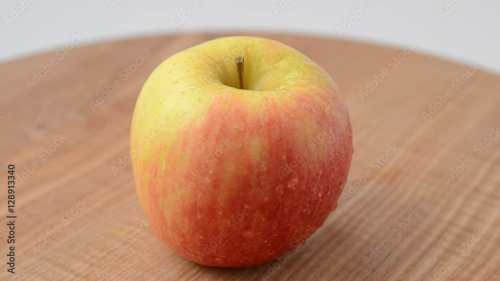 Apples on a board. Shooting in the movement. Apples on a board. Shooting in the movement.