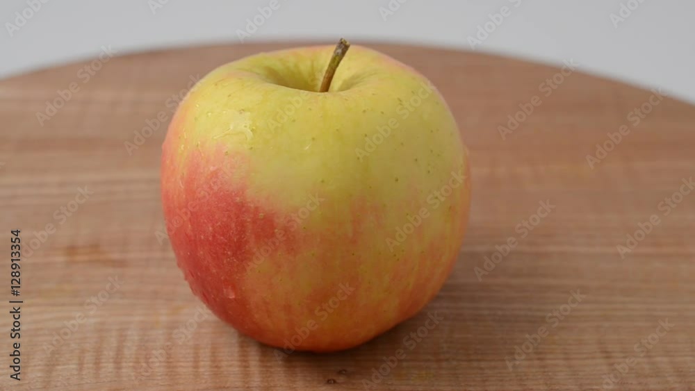 Apples on a board. Shooting in the movement. Apples on a board. Shooting in the movement.