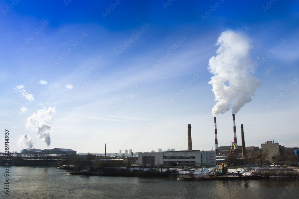 Thick smoke from factory chimneys. Pipe with smoke. Heat energy Thick smoke from factory chimneys. Pipe with smoke. Heat energy