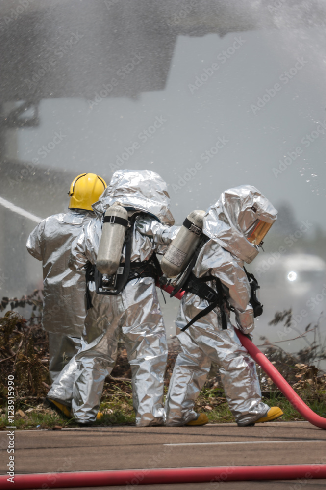 Naklejka premium Fire departments & emergency response teams suited up with PPE t