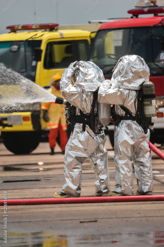 Fototapeta premium Fire departments & emergency response teams suited up with PPE t
