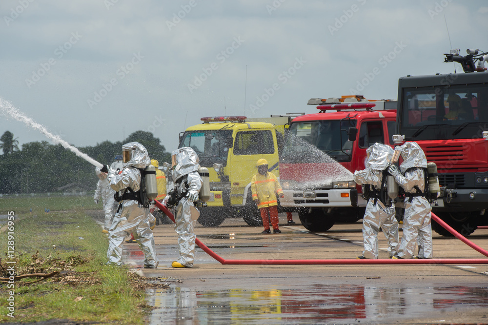 Naklejka premium Fire departments & emergency response teams suited up with PPE t