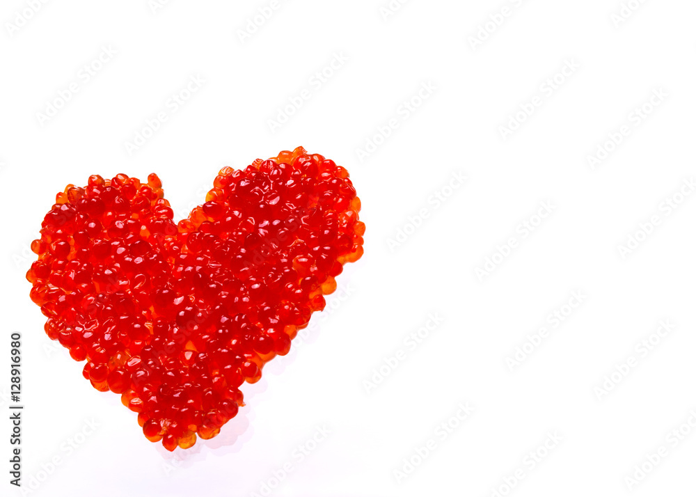 Heart made of red caviar. Small red kechuzh' roe laid in the form of heart. Delicious! And it is a symbol of the New Year and Valentine's Day.