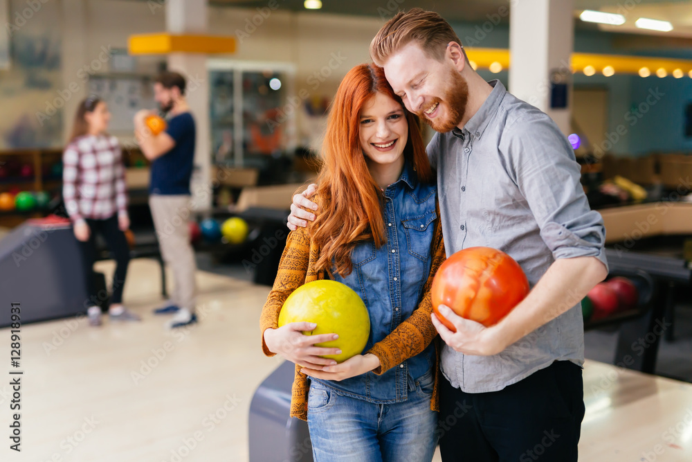 Fototapeta premium Beautiful couple dating and bowling