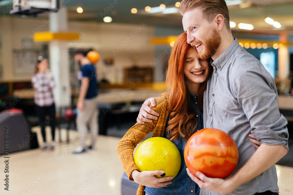 Fototapeta premium Beautiful couple dating and bowling