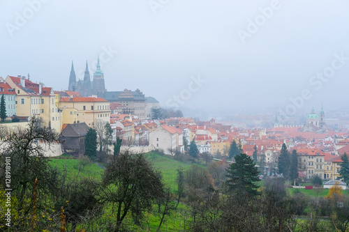 Prague, Czechia - November, 24, 2016: panorama of an old Prague with St. Vitus Cathedral and Prague Castle, Czechia photo