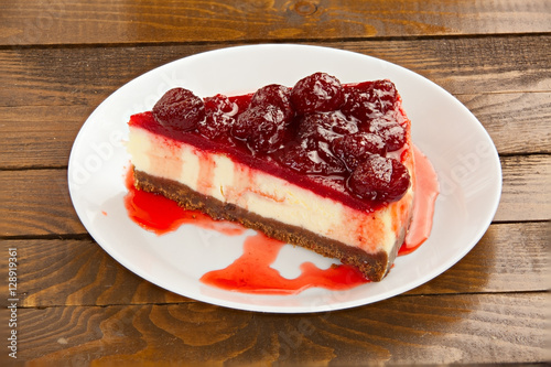 delicious cheesecake with strawberries photo