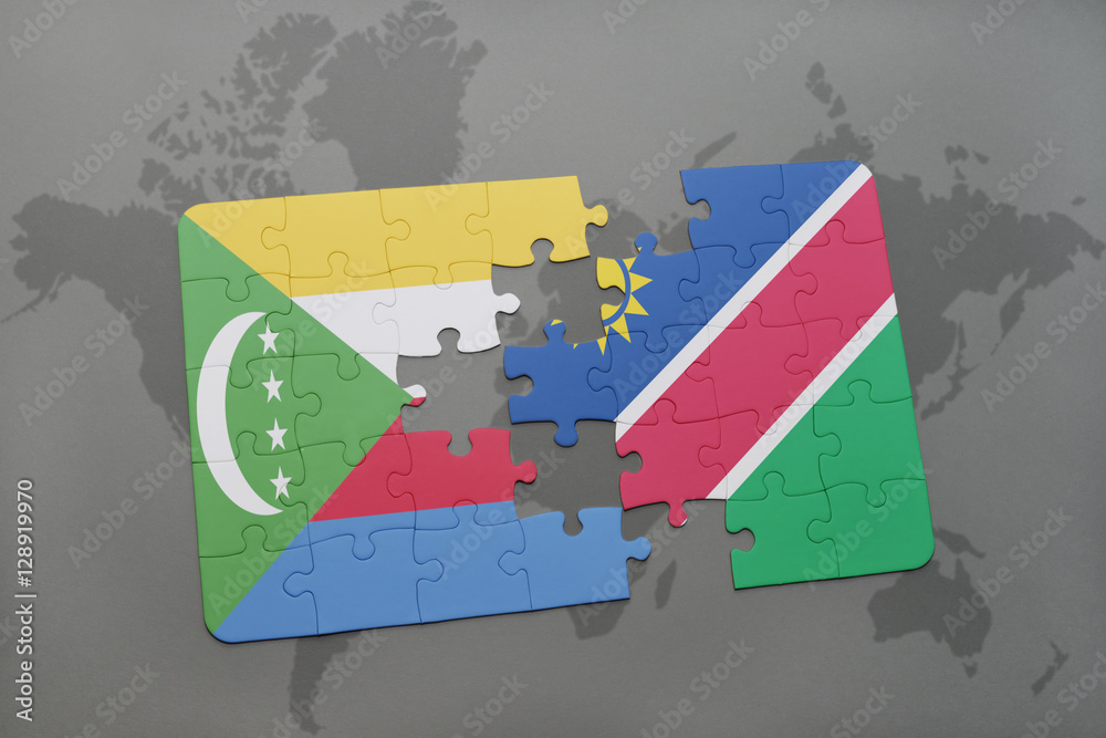 puzzle with the national flag of comoros and namibia on a world map