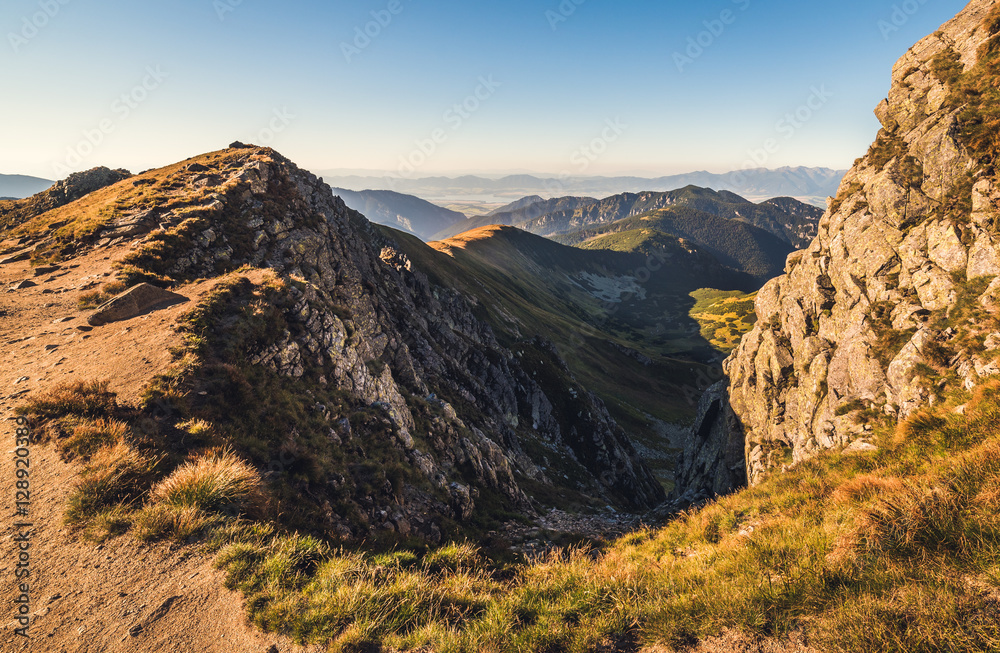 Mountain Landscape in Light of Setting Sun. View from Mount Dumbier in Low Tatras, Slovakia. West Tatras Mountains Background.