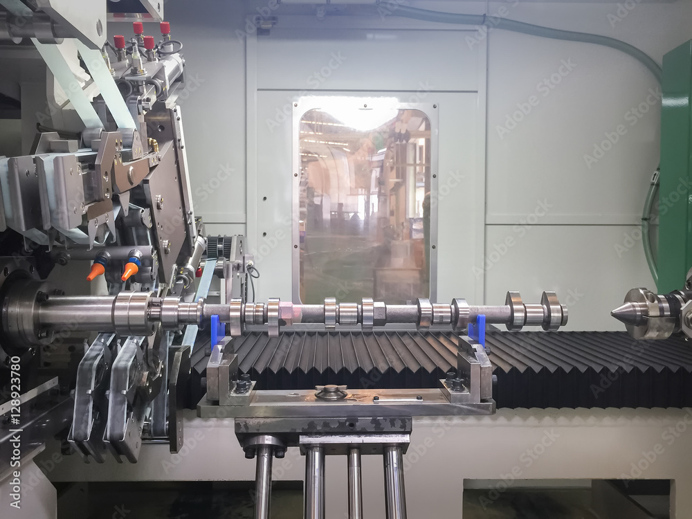 High precision CNC machining center working, operator machining