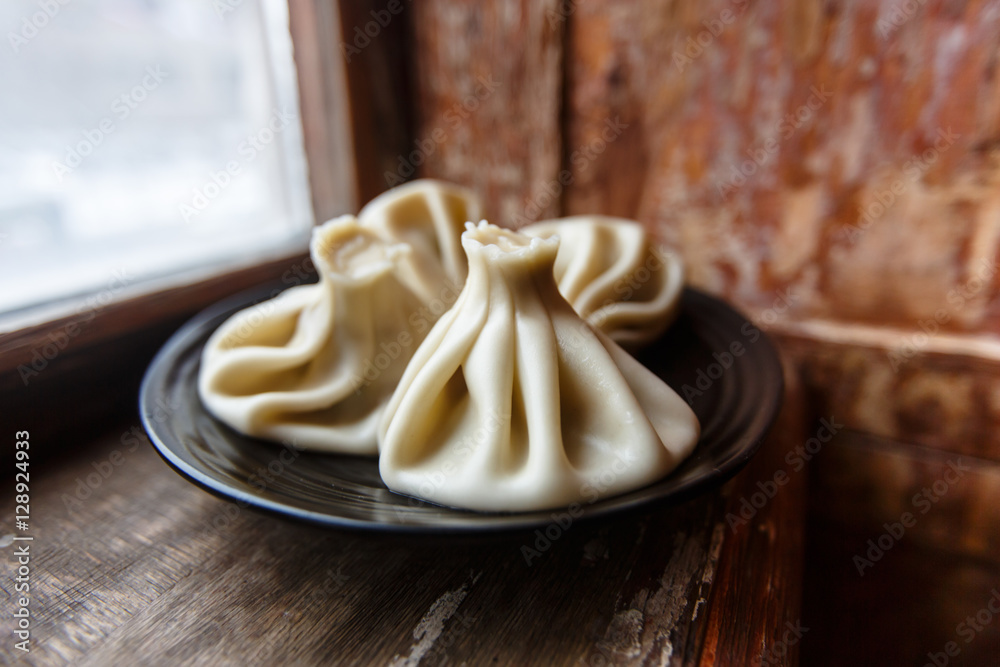 Traditional Georgian food khinkali. Minced meat with spices wrap