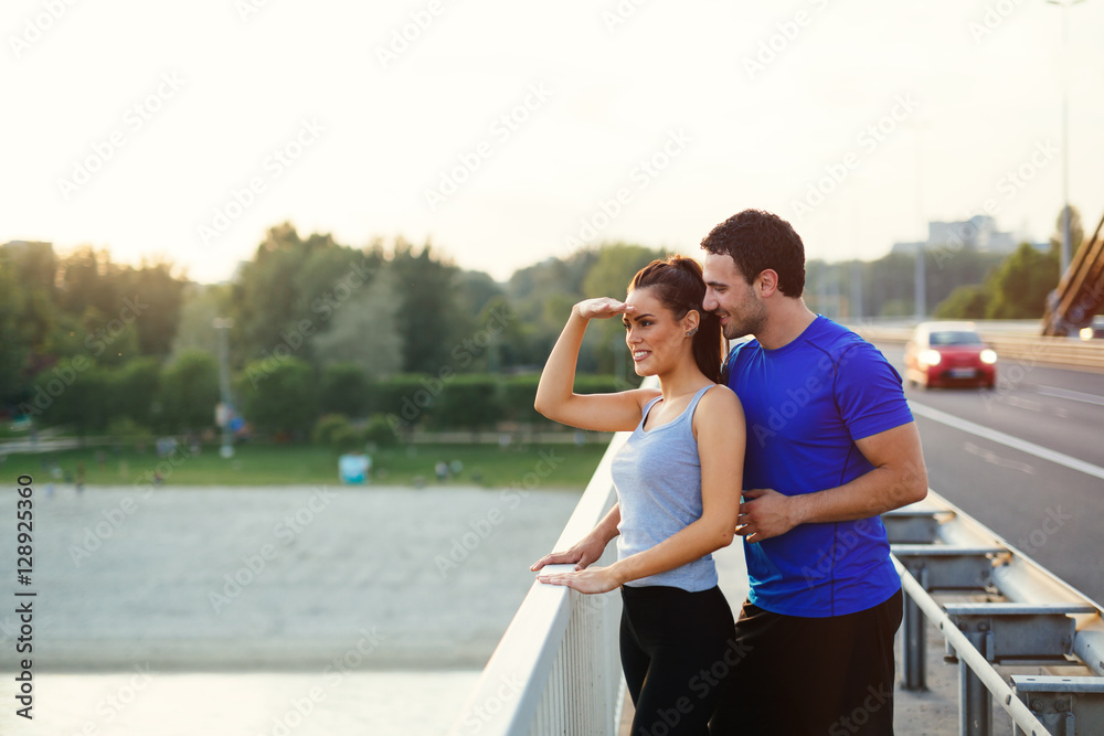 Athletic couple jogging together