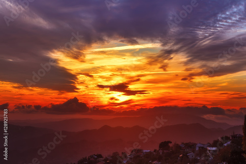 Amazing mountain landscape with colorful vivid sunset on the bright sky  natural outdoor travel background