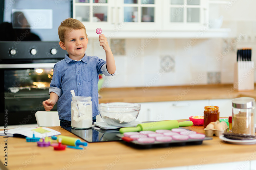 Adorable child making cookies Adorable child making cookies