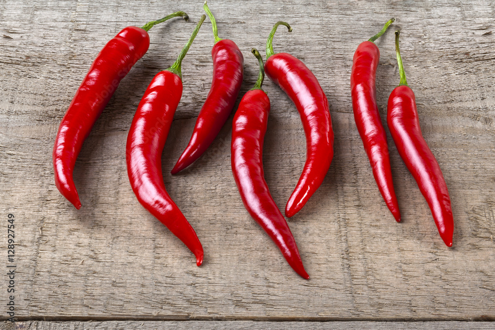 Red Chillies on Rustic Background
