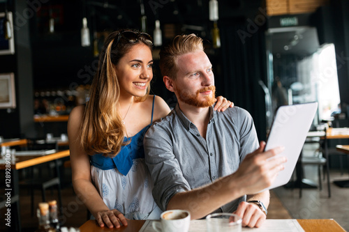 Woman and man flirting in cafe