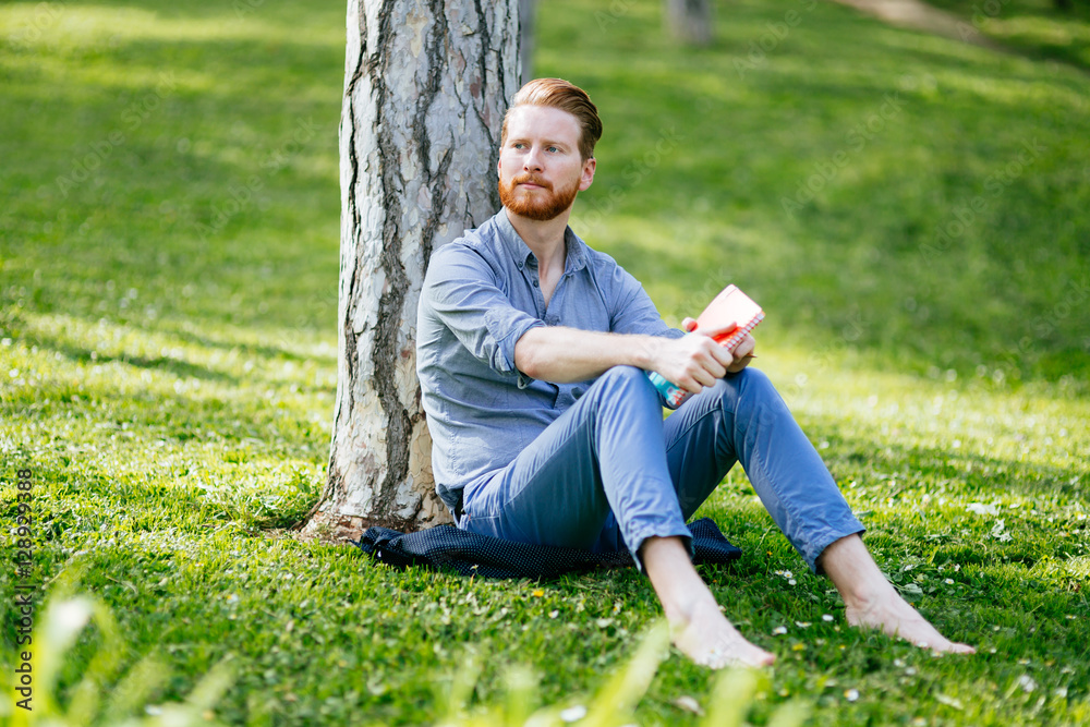Fototapeta premium Student studying in park