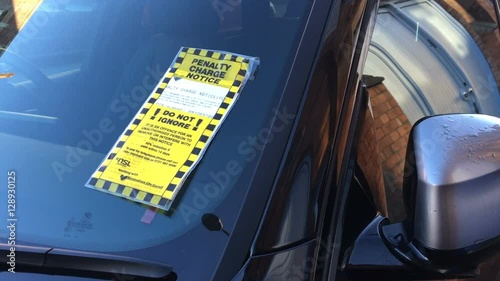 Parking Ticket on Car Windscreen Window - Drive recieving Fine