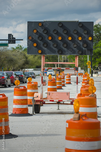 Road closed signs detour traffic temporary barrel arrow light