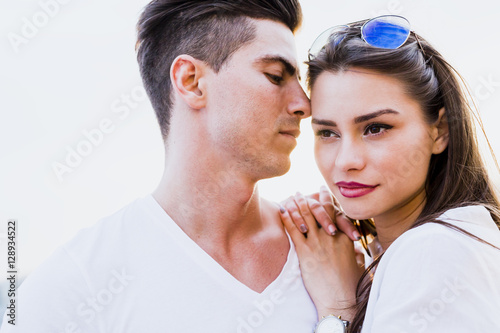 Young glamorous couple expressing sensuality