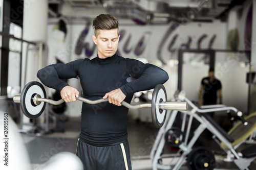 Young man training in a gym