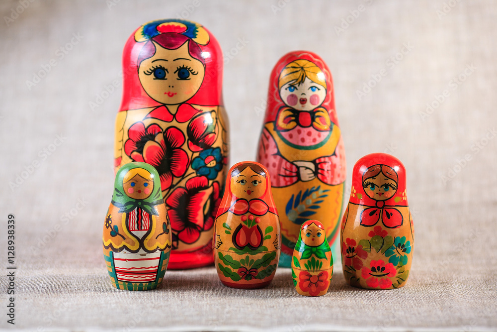 Russian dolls. Matryoshka on linen fabric for the background.