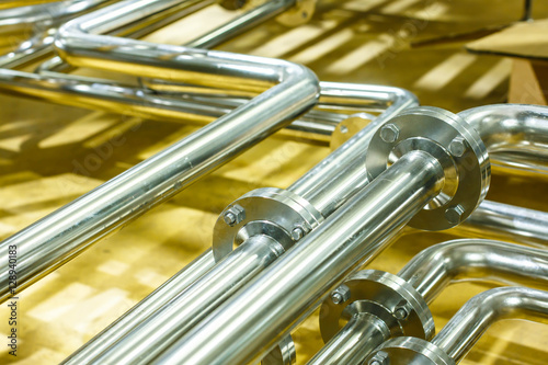 Industrial factory equipment stainless tubes Food automation. © patboon