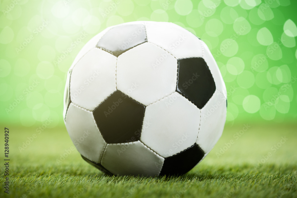 Fototapeta premium Football On Grassy Field
