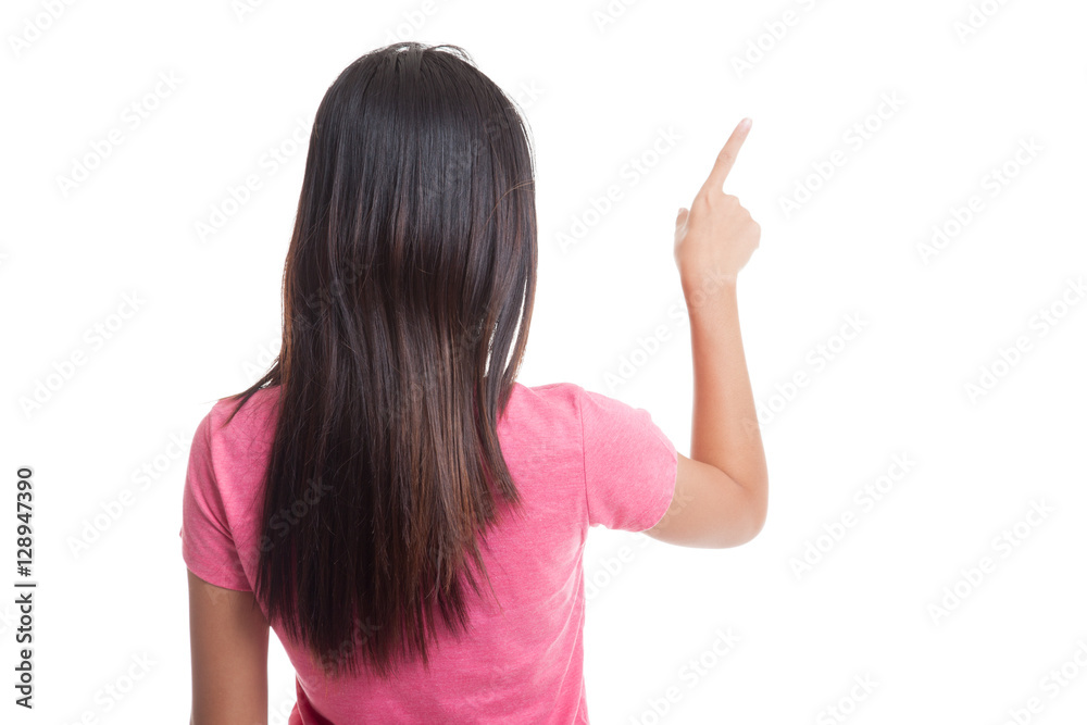 Back of Asian woman touching the screen with her finger Back of Asian woman touching the screen with her finger