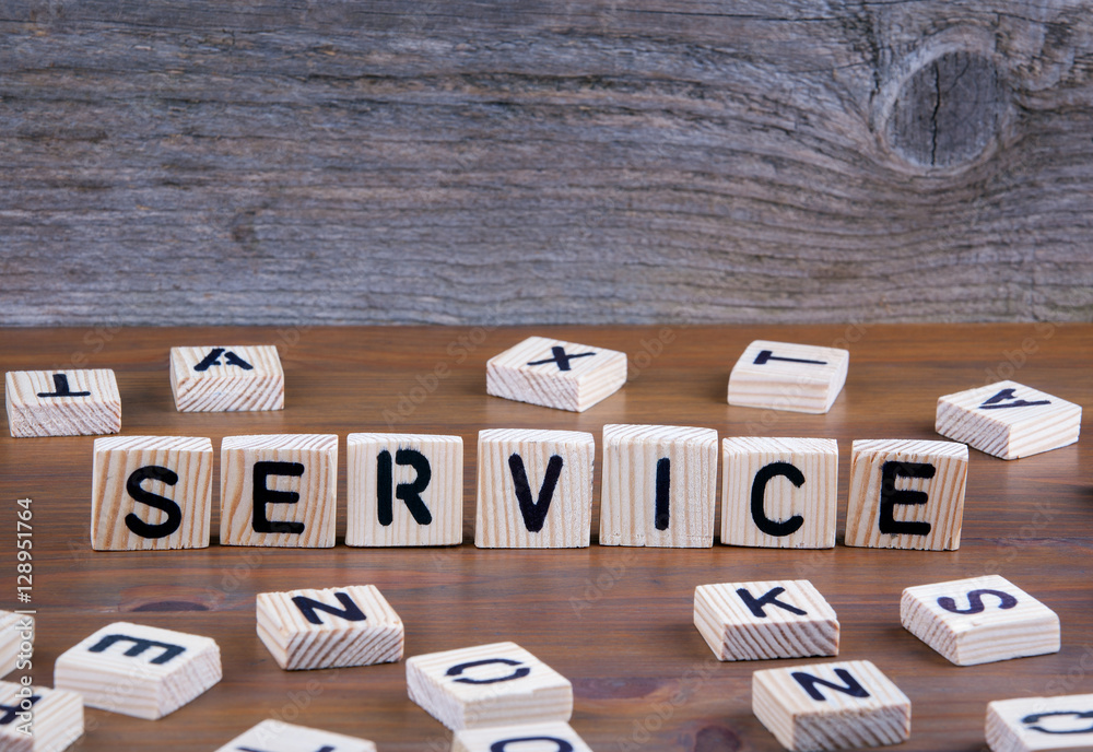 Service from wooden letters on wooden background Service from wooden letters on wooden background