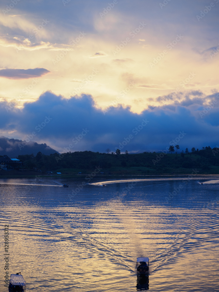 Fototapeta premium Fog,morning light a view from from the bridge. the Sagklaburi,Ka