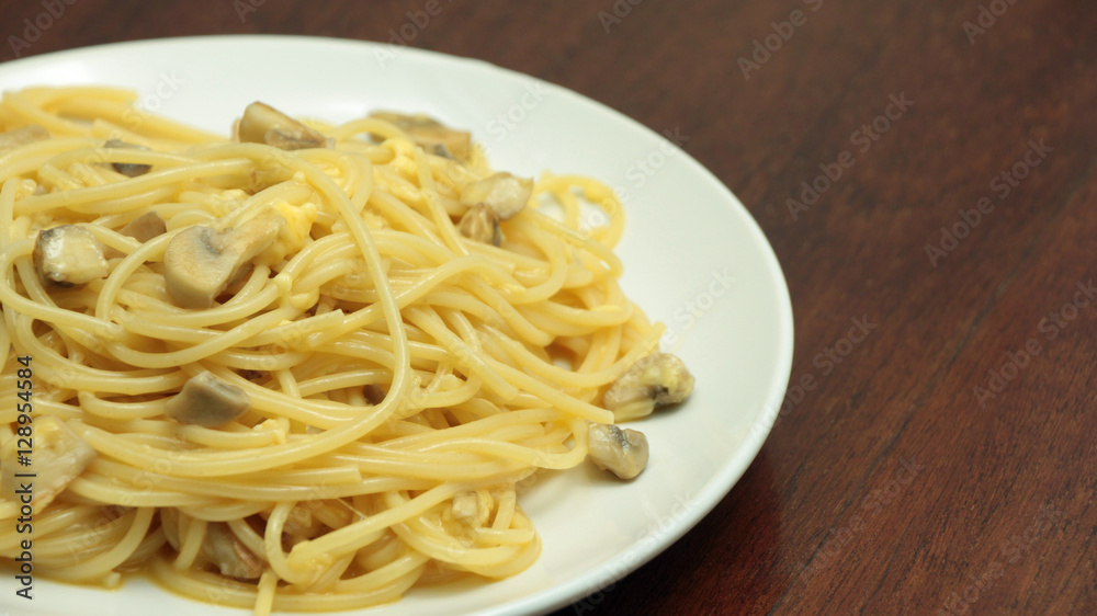 Pasta Carbonara with Mushrooms on White Plate