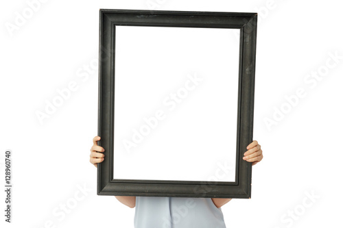 Woman hands holds black empty frame