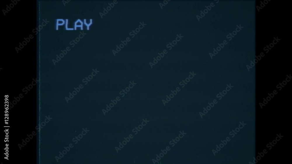 An old damaged VHS tape playing, black screen with PLAY text. A vintage background for videos, a