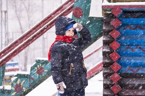 boy outdoors in the winter snow