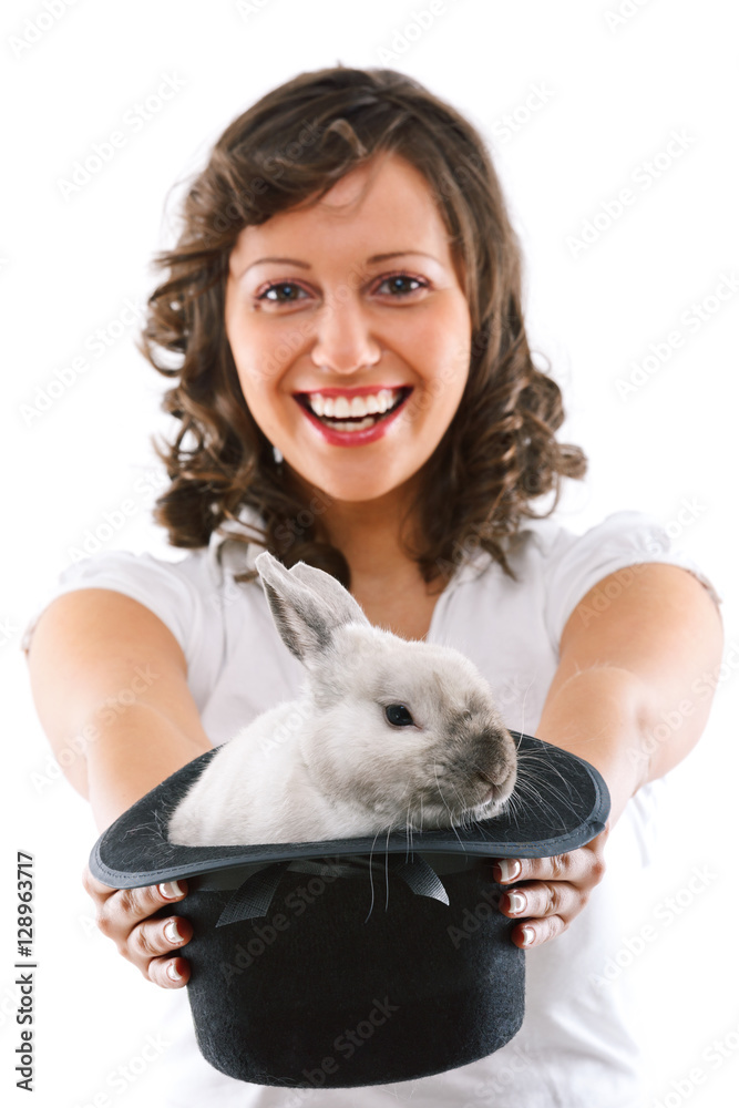 Magician with rabbit in magic hat isolated on white background Magician with rabbit in magic hat isolated on white background