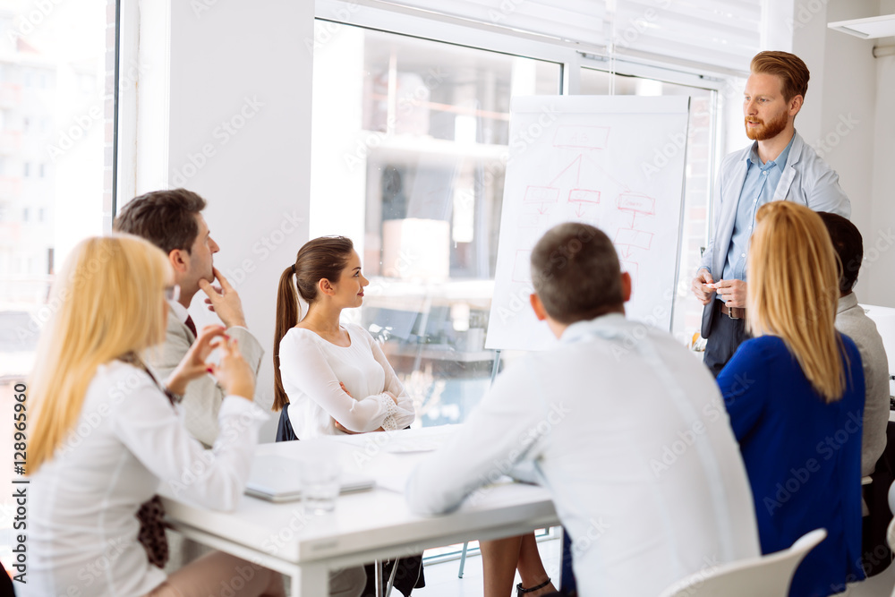 Businesspeople collaborating in office Businesspeople collaborating in office