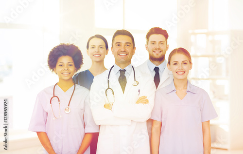 group of happy doctors at hospital © Syda Productions