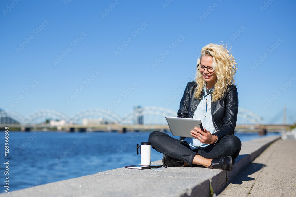 Fototapeta premium Modern woman using tablet