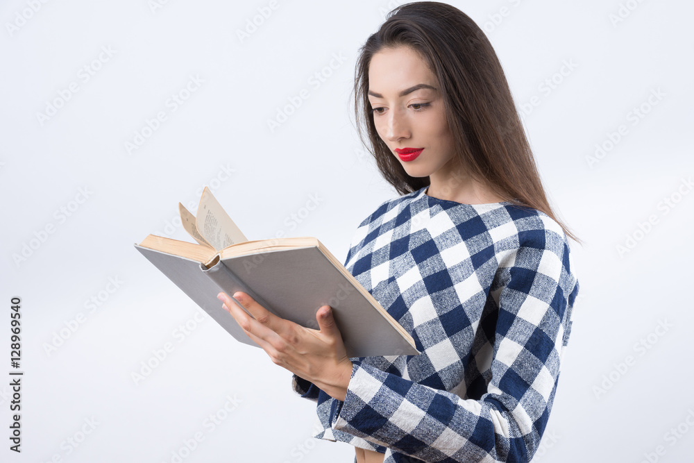 young girl with book on a white background young girl with book on a white background