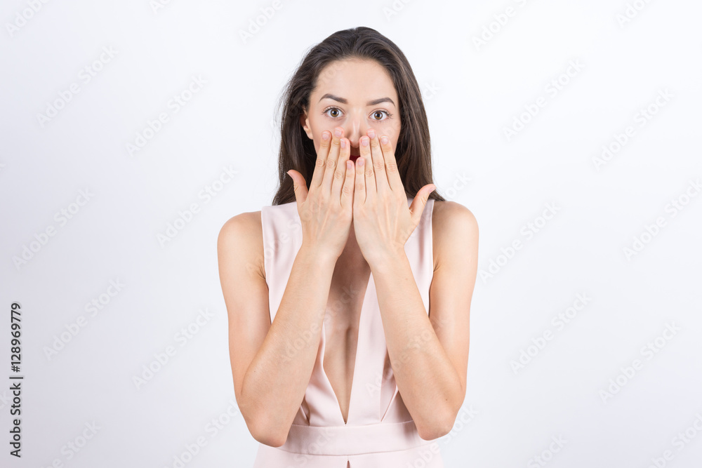 young woman with expression of surprise on his face on white young woman with expression of surprise on his face on white