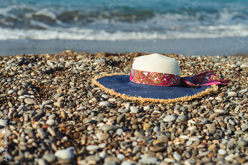 Woman hat on the beach.
