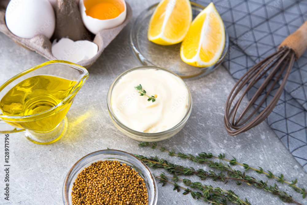 Fresh homemade white sauce Mayonnaise and ingredients eggs, lemo Fresh homemade white sauce Mayonnaise and ingredients eggs, lemo