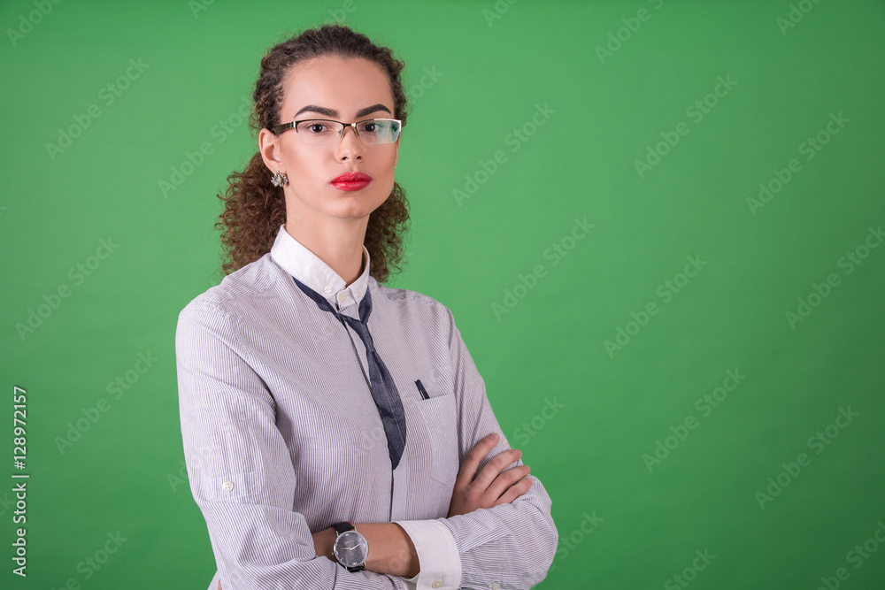 portrait of a businesswoman or a consultant on a green backgroun portrait of a businesswoman or a consultant on a green backgroun
