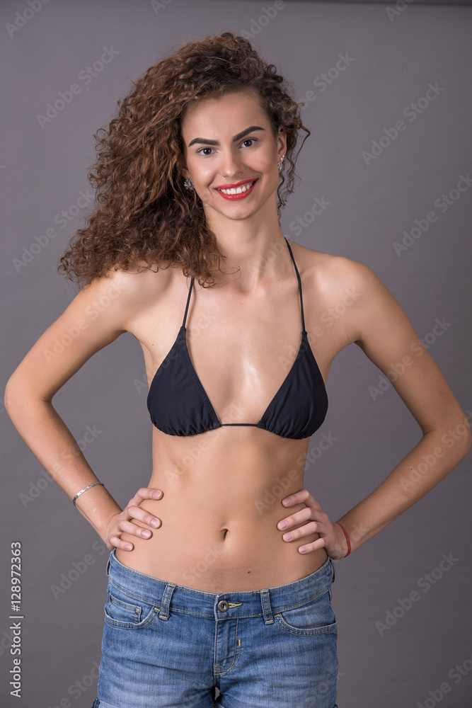 beautiful curly girl smiling, laughing, fooling around, having f beautiful curly girl smiling, laughing, fooling around, having f