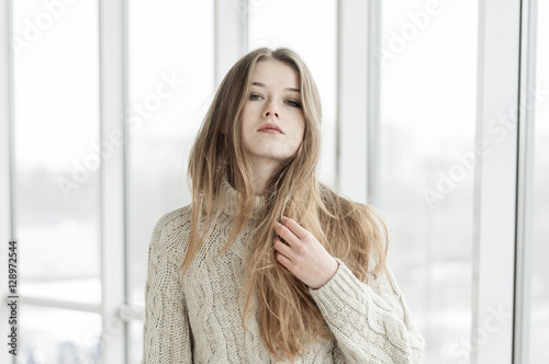 Portrait of a young woman indoors