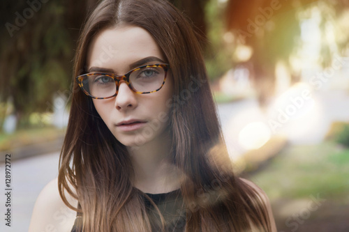 girl with glasses in the street, fashion, glamor