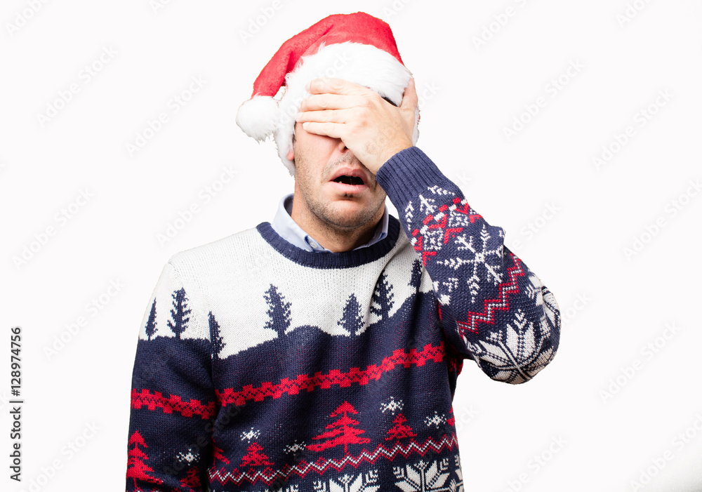 Frightened young man at Christmas Frightened young man at Christmas