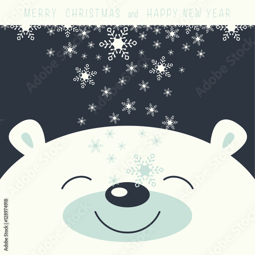 The cover design. Depicts face smile little polar bear on the dark background. The falling snowflakes on the face polar bear. Phrase merry Christmas and a happy New year.